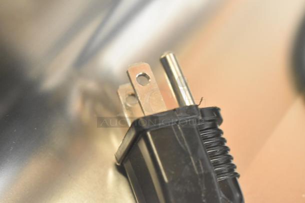 Close-up of the plug for the 2025 Avantco 177W50 Countertop Food Warmer, showcasing the power connection.