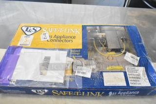 BRAND NEW T&S Safe-T-Link 48" yellow gas appliance connector hose, 3/4" NPT, with FreeSpin fitting and installation kit.