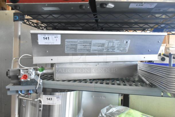 Brand new Heatstar 4000 Series radiant gas heater, 40,000 BTU, spark ignition. Visible tags list model F140629. Scratch and dent condition.