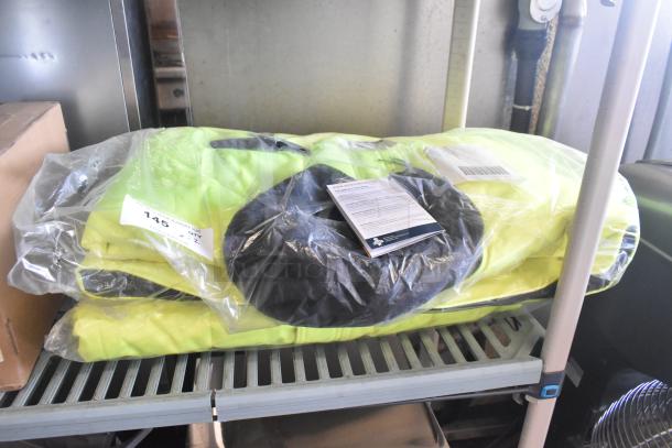 2 brand new Hivis RefrigiWear jackets in packaging. Includes tags indicating auction and condition as scratch and dent.