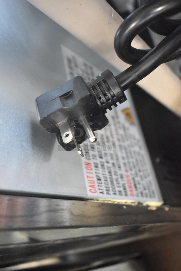 Alt text: Avantco 184T3600B conveyor toaster, 3600W, 208V plug and caution label visible. Brand new, scratch and dent condition.