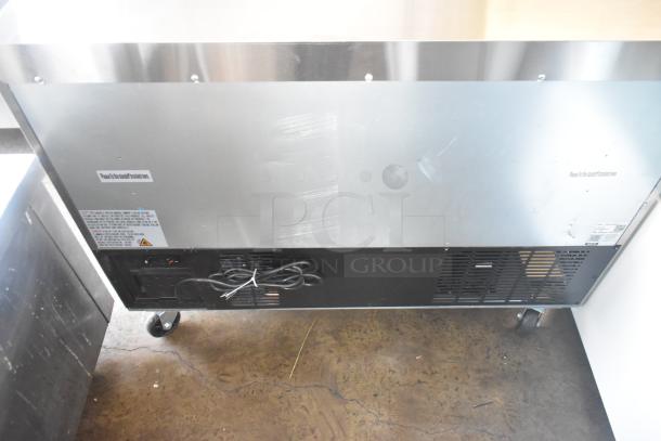 Avantco 178SSUC48RHC 2 Door Work Top Cooler on casters, stainless steel, 115V, commercial use, visible power cord.