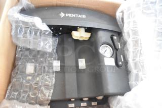 Pentair Everpure EZ-RO BL Reverse Osmosis System in box, gauges visible, protective packing included. Appears unused.