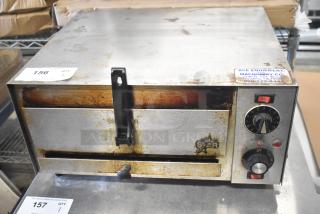 Star P012 countertop electric pizza oven, used condition, 120 volts, single phase, visible dials and Star logo.