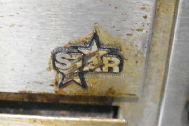Star P012 Countertop Electric Pizza Oven with visible logo, 120V, 1 Phase, stainless steel, showing signs of wear.