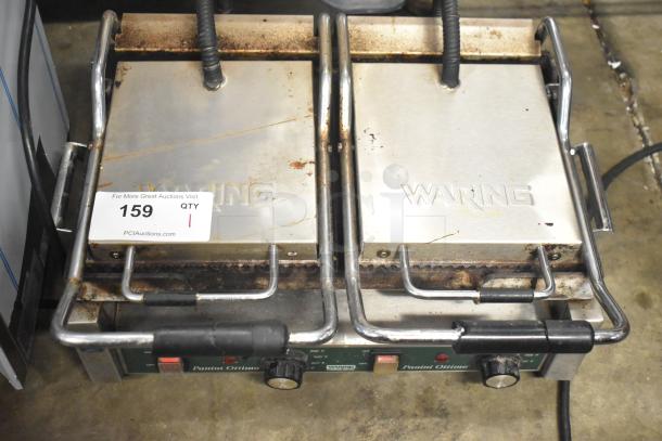 Waring WPG300 countertop double panini press, stainless steel, visible wear, 240 volts, single phase, model WPG300.