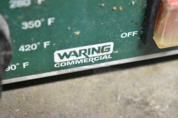 Waring WPG300 Panini Press, 240V, featuring temperature markings. Visible "Waring Commercial" label, in used condition.