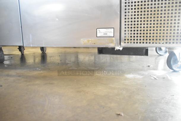 True TPP-60 commercial pizza prep table on casters, stainless steel, 115V, used condition, minor surface marks.
