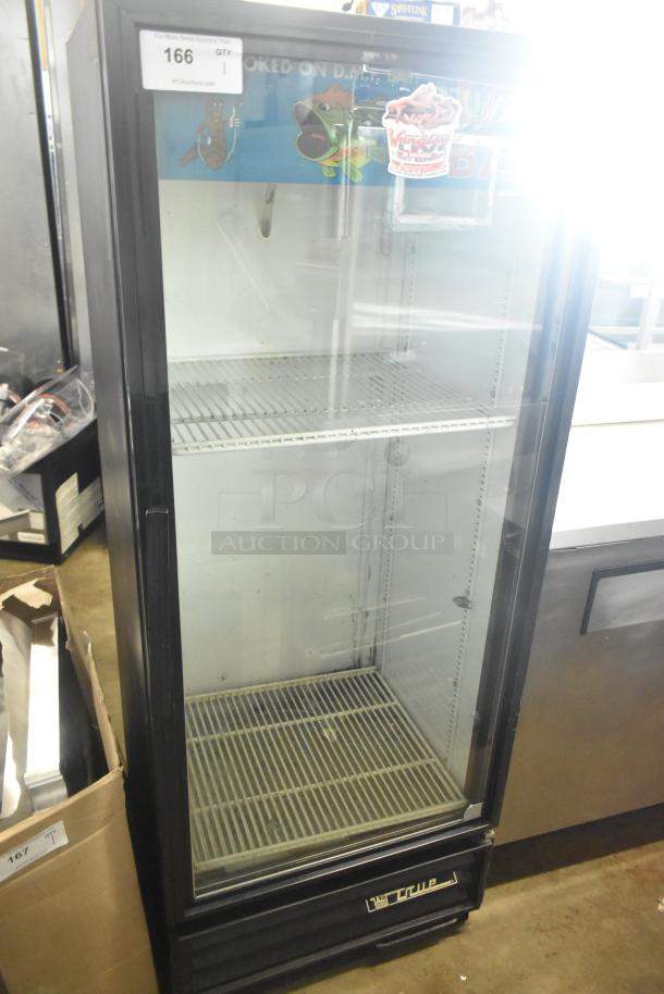 True GDM-12 commercial single door reach-in cooler, 115 volts, 1 phase, used, featuring wire shelves and glass front.
