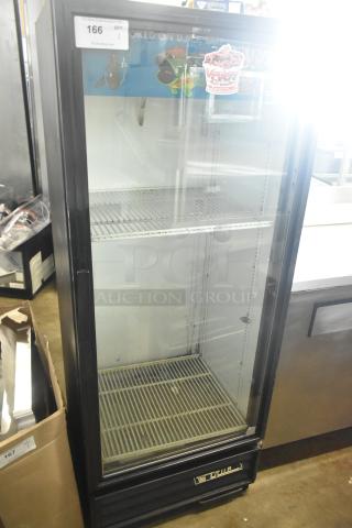 True GDM-12 commercial single door reach-in cooler, 115 volts, 1 phase, used, featuring wire shelves and glass front.