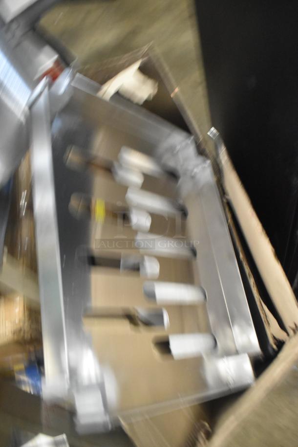 Brand new Robot Coupe R199 Robo-Cart with minor scratches and dents. Sturdy metal construction, ideal for commercial use.