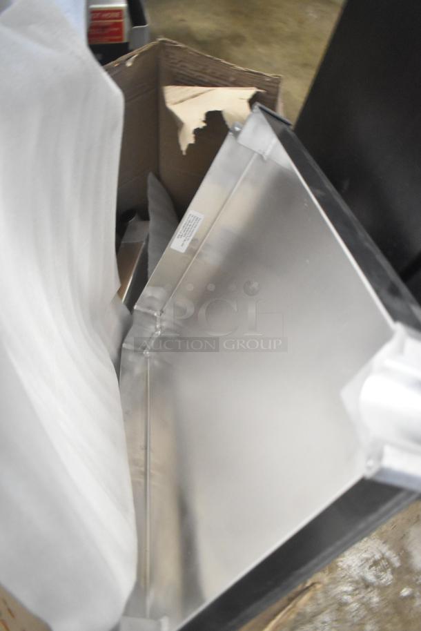 Brand new Robot Coupe R199 Robo-Cart, showing packaging and slight scratches. Silver finish, durable material.