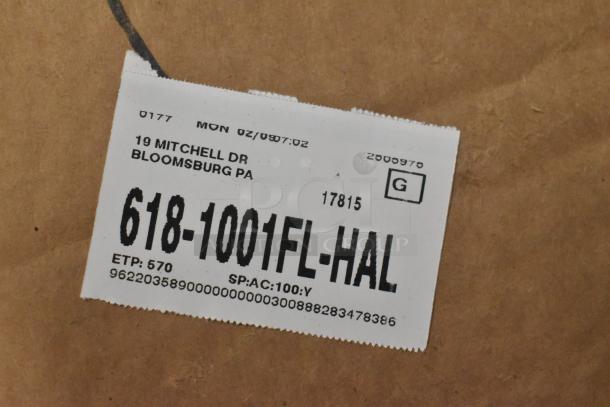 Label on brown packaging with text: "19 Mitchell Dr, Bloomsburg PA, 618-1001FL-HAL, ETP: 570, SP: AC: 100: Y."