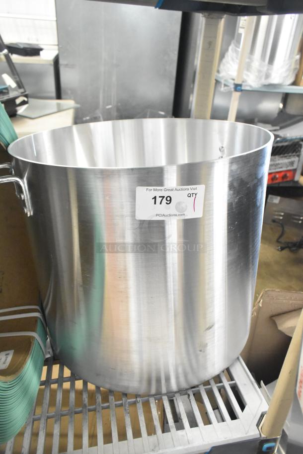 BRAND NEW Choice 471SP100QTHD 100 Qt. Aluminum Stock Pot, heavy weight, minor scratches, auction tag visible.