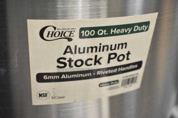 Brand new Choice 100 Qt. heavy-duty aluminum stock pot with label showing 6mm aluminum and riveted handles. Scratch and dent condition.