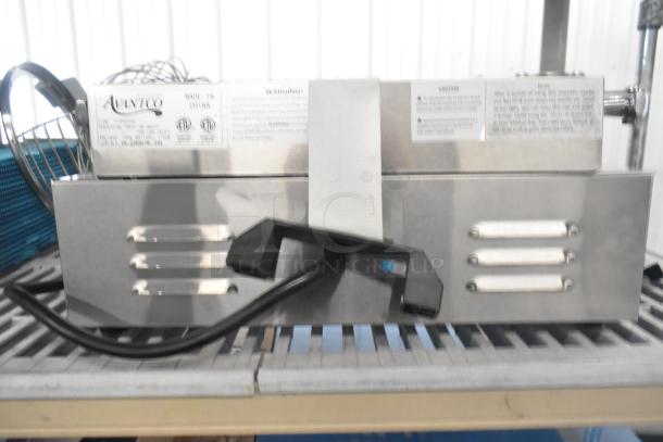 Brand new Avantco 177PG200S commercial panini grill with smooth plates, 13 3/8" x 8 3/4" surface, 120V, 1 phase.