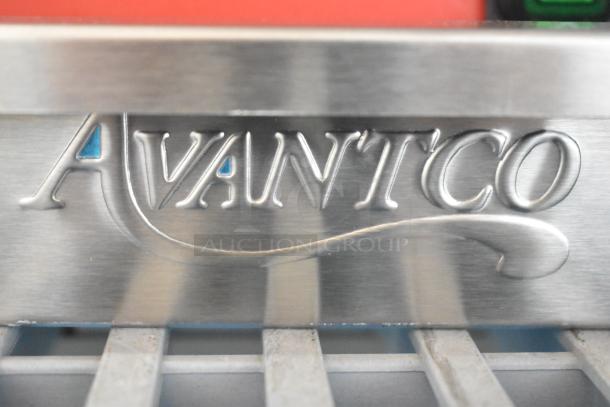 Brand new Avantco 177PG200S commercial panini grill, smooth plates, 13 3/8" x 8 3/4" surface, 120V, stainless steel.