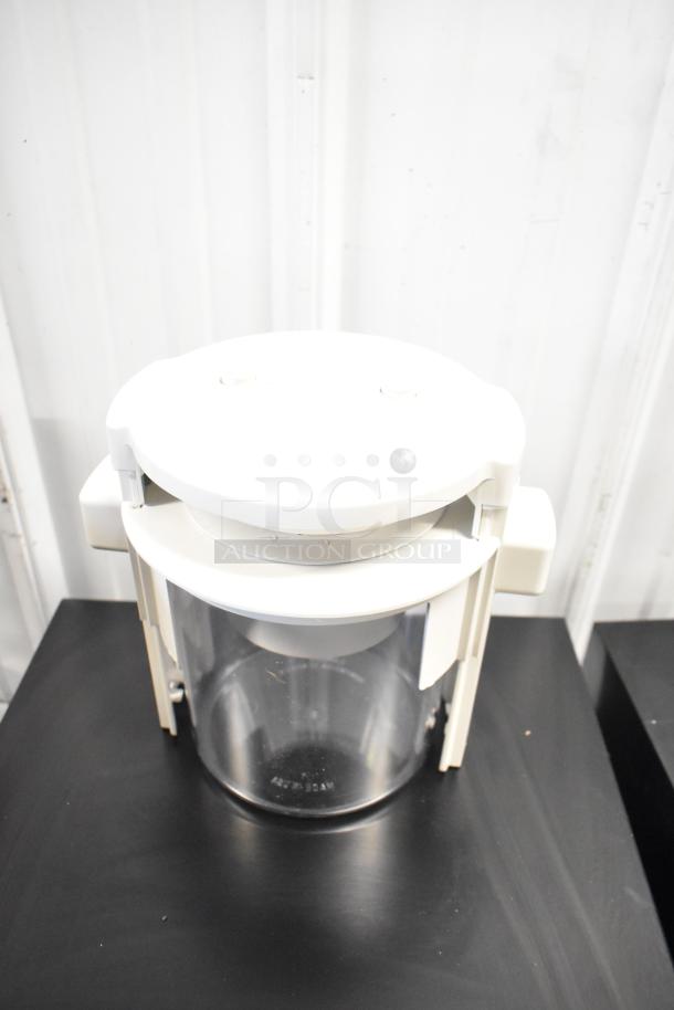 Brand new Sunkist B-202 Sectionizer Jr. with 6-wedge attachment. Slight scratches and dents visible.