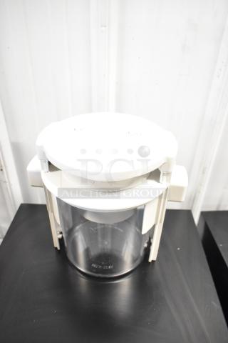 Brand new Sunkist B-202 Sectionizer Jr. with 6-wedge attachment. Slight scratches and dents visible.