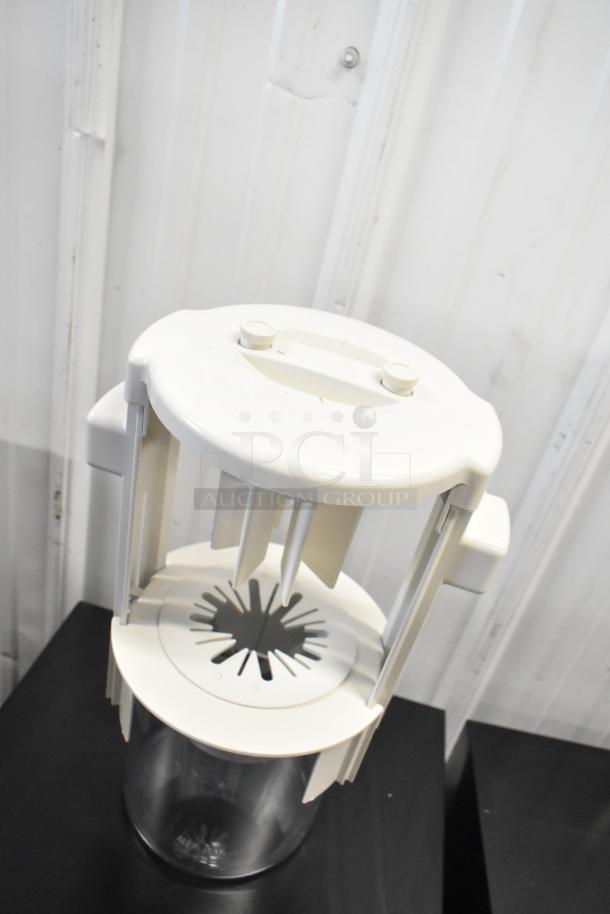 BRAND NEW SCRATCH AND DENT Sunkist B-202 Sectionizer Jr. with 6-wedge attachment, model 771B202. Minor cosmetic damage.