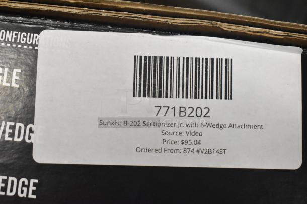 Brand new Sunkist B-202 Sectionizer Jr. with 6-wedge attachment, model 771B202, labeled as scratch and dent.