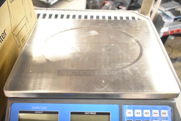 AvaTek PCS40 40 lb. digital price computing scale, new scratch and dent condition, model 334PCS40, legal for trade.