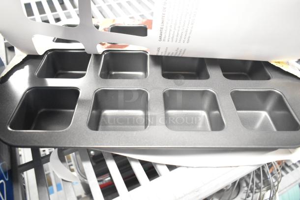 BRAND NEW Wilton 12-Compartment Non-Stick Steel Brownie Pan, 2.5"x2.5"x1.5" cavities, scratch and dent.