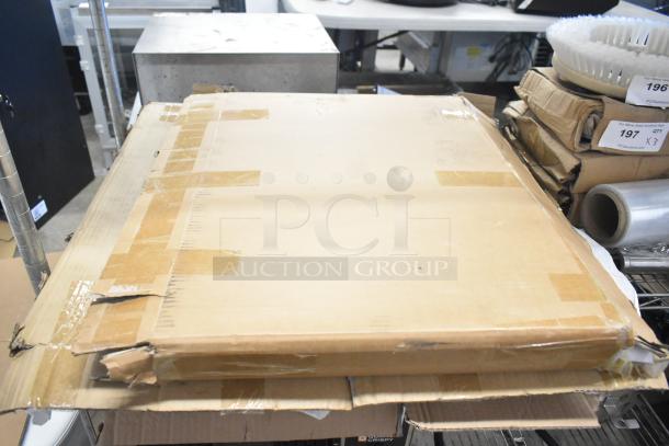 Three brand new scratch and dent items in a taped cardboard box, including metal racks. 3x your bid offer.