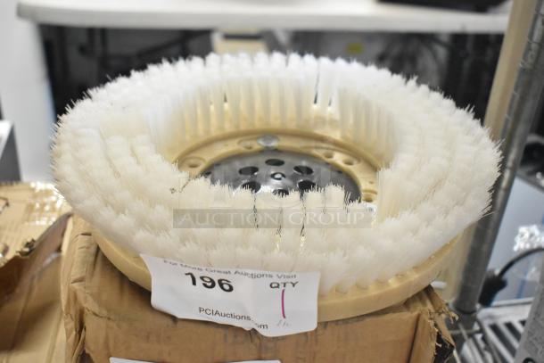 Brand new scratch and dent floor scrubbing machine brush with white bristles, item tag marked "196."