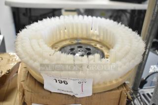 Brand new scratch and dent floor scrubbing machine brush with white bristles, item tag marked "196."