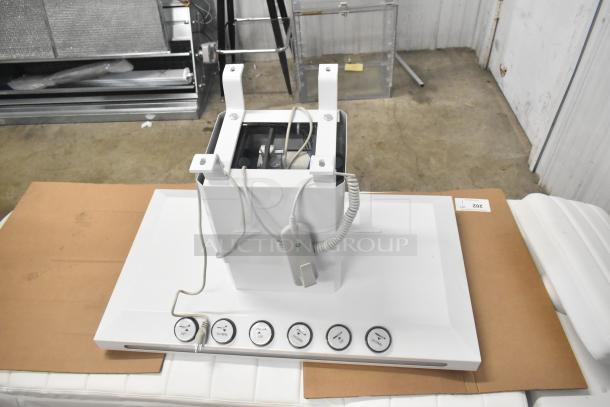 Electronic bed with remote for seat positioning and heat option. Includes control panel with labeled buttons. Good condition.