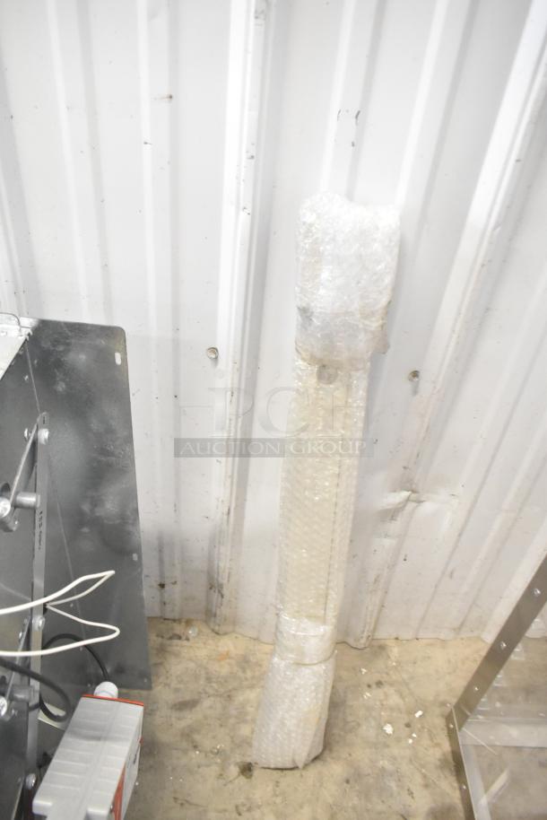 BRAND NEW Daikin Hood w/ McDaniels Metal 122-DK-090 Economizer, scratch and dent condition, wrapped in bubble wrap.