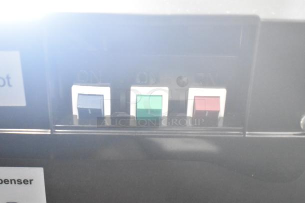 Avalon A23 floor water dispenser control panel with three switches (blue, green, red) labeled "ON". Model A23, 115V, 1 Phase.