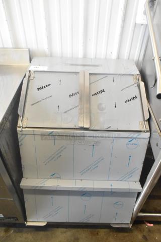 Brand new ServIt 423TCW46 chip warmer, 46 gallon, first-in first-out, 120V, minor scratches, protective covering visible.