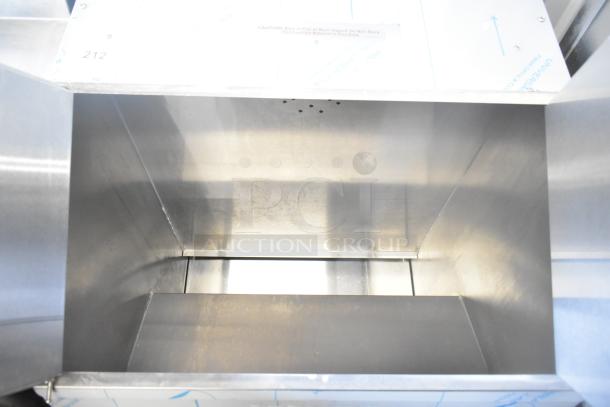 Brand new ServIt 423TCW46 46-gallon chip warmer, first-in first-out design, interior view, minor scratches, 120V, 1 phase.