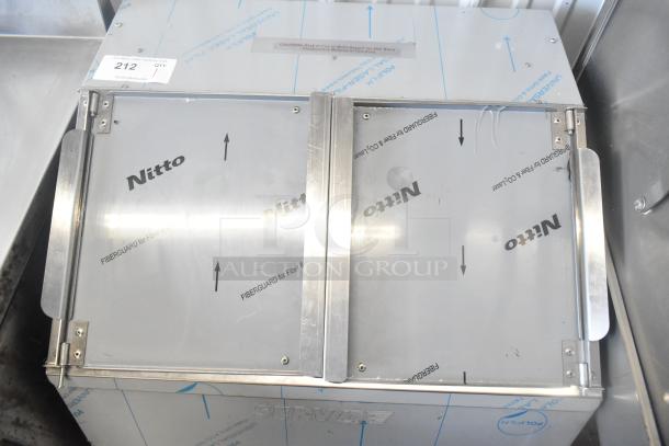 Brand new ServIt 423TCW46 chip warmer, 46-gallon, with scratches and dents. Features protective film and caution label.