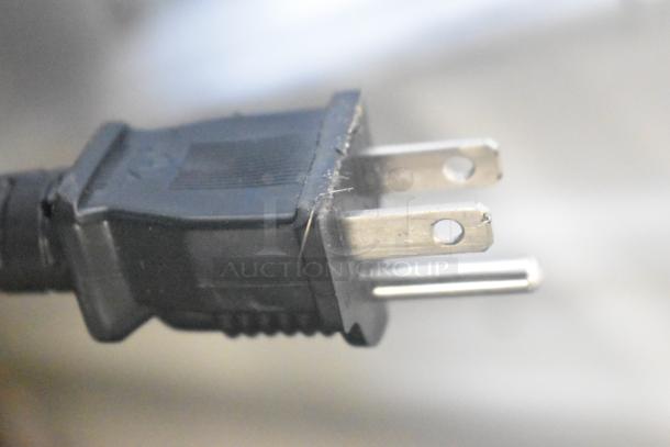 Close-up of a power plug for the ServIt 423TCW46 chip warmer. 120 volts, 1 phase. Suitable for brand new scratch and dent model.