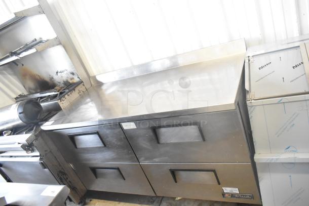 True TWT-60D-4 commercial cooler, stainless steel, 4 drawers, 115 volts, 1 phase, excellent condition, visible True logo.