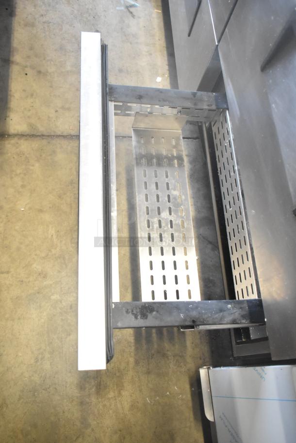 True TWT-60D-4 commercial cooler, stainless steel, 4-drawer, 115V, 1 phase, clean interior, slight exterior wear.