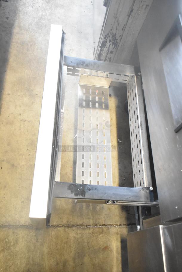 True TWT-60D-4 commercial 4 drawer work top cooler, open drawer view, stainless steel, 115 volts, 1 phase.