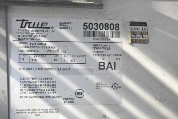 Close-up of a True TWT-60D-4 Cooler label showing model, serial number 5030808, refrigerant R134A, 115V, 1 phase. Made in USA.