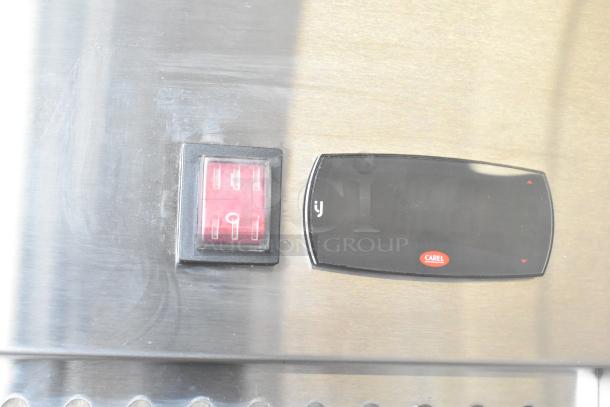 Avantco 178Z1FHC commercial freezer control panel; features red switch and digital display with Carel branding.