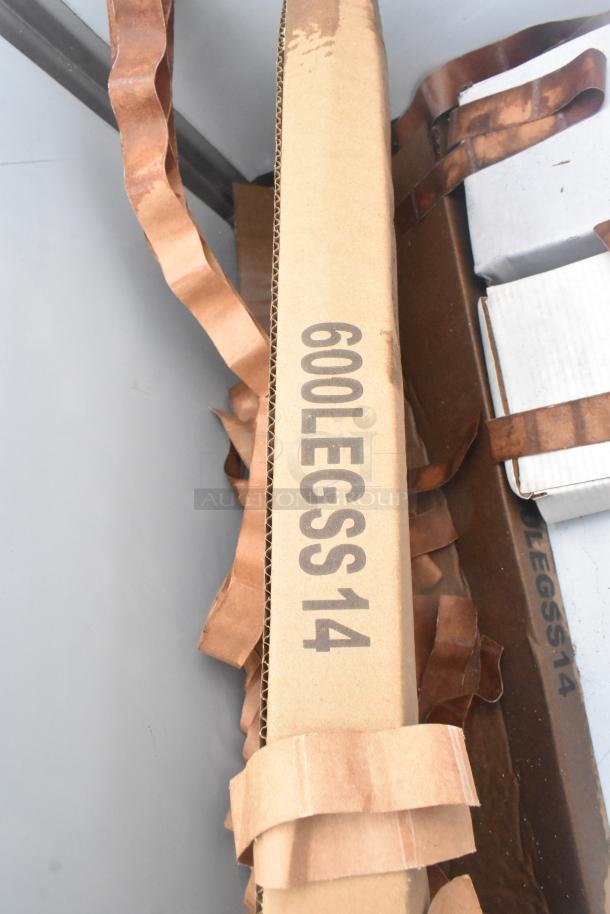 Box labeled "600LEGSS14" for Steelton 522US12424 utility sink, 24" x 24" x 14", scratch and dent condition.