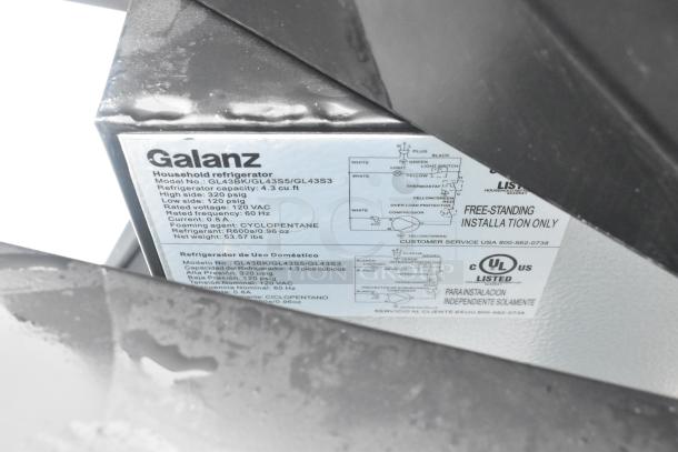 Label on Galanz mini cooler, Model GL43BK, capacity 4.3 cu. ft., 120 VAC, for auction of 6 various coolers.