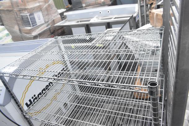 Chrome finish 3-tier wire shelving unit in used condition. Buyer must dismantle. Consider freight charges for shipping.