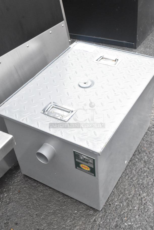 BRAND NEW Regency 30 lb. grease trap, 15 GPM, with 2" non-threaded connections. PDI Certified. Slight cosmetic dents.