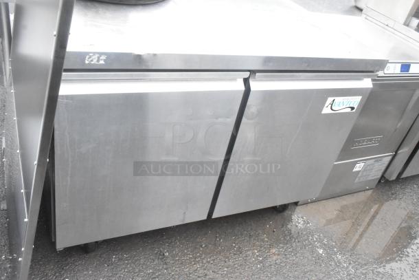 Avantco 178SSUC48FHC 2-door work top freezer on casters, stainless steel, 115V, 1 phase, commercial use.