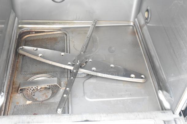 2018 Hobart LXER undercounter dishwasher interior, showing metal spray arms and filter. Good condition, 120/208-240V, 1 Phase.