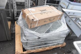 13 new Regency 460EC1430 NSF chrome wire shelves, 14" x 30", slight scratches and dents, in packaging on pallet.