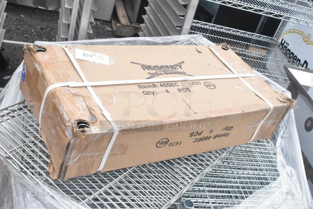 Box labeled Regency 460EC1430 on chrome wire shelves; NSF certified. Contains four pieces. Box slightly damaged.